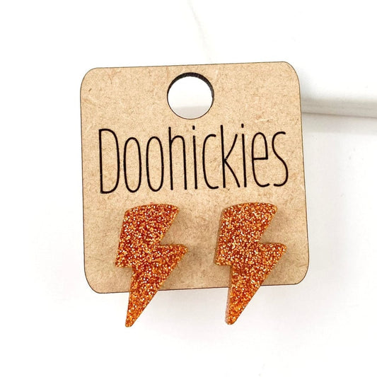 20mm School Spirit Lightning Bolt Studs - Orange Glitter